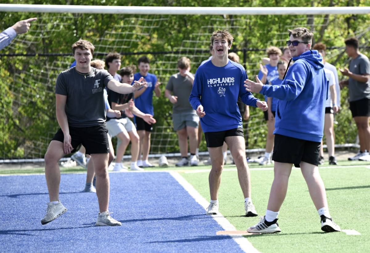 Junior players appeal to the umpire after a controversial call. 